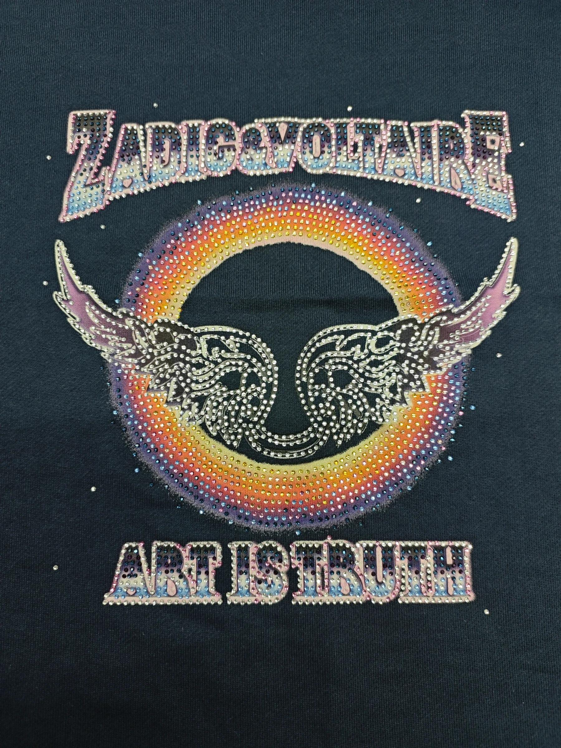 Discharge Digital on Navy fabric with Stone work Emblishment done by Macrofast on 180 gsm - Jersey fabric Bio washed  with Discharge with Screen printing, then Digital printing on top using 6 colour - Cyan, Magenta, Yellow, Black, Red and Green. Then Stone work emblishments been carried out on the top